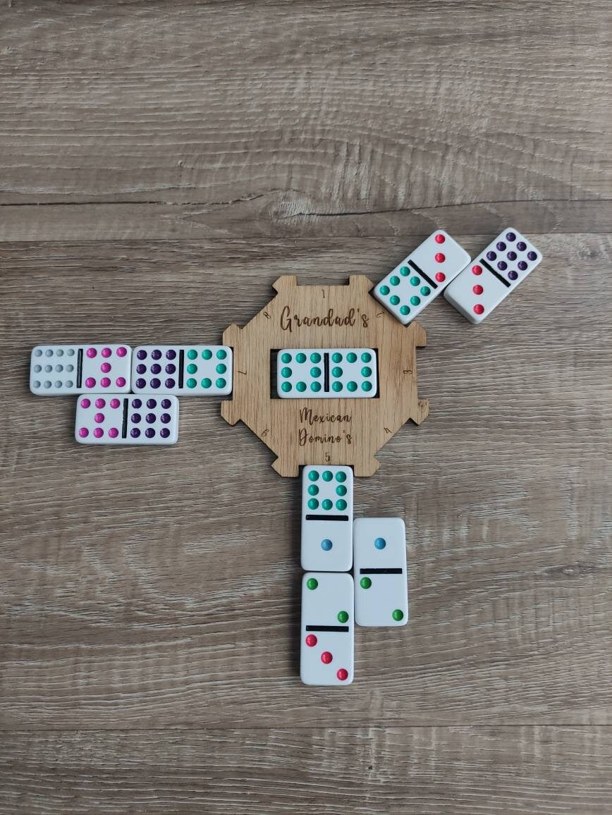 Personalised wooden hub for use with the Mexican Dominos game, custom engraved with any name. This beautifully crafted hub adds a unique, personal touch to your game setup.