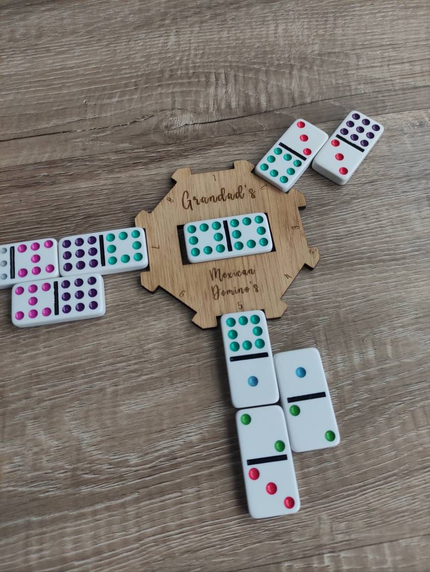 Personalised wooden hub for use with the Mexican Dominos game, custom engraved with any name. This beautifully crafted hub adds a unique, personal touch to your game setup.