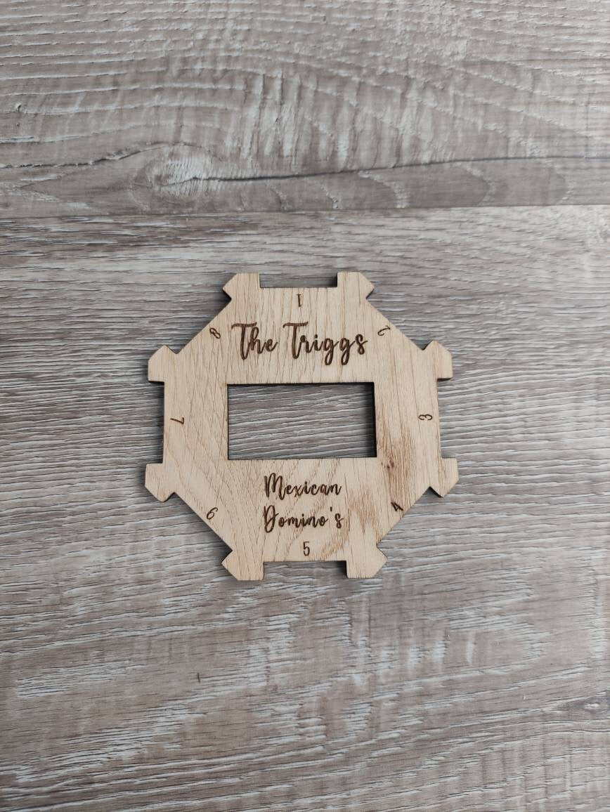Personalised wooden hub for use with the Mexican Dominos game, custom engraved with any name. This beautifully crafted hub adds a unique, personal touch to your game setup.