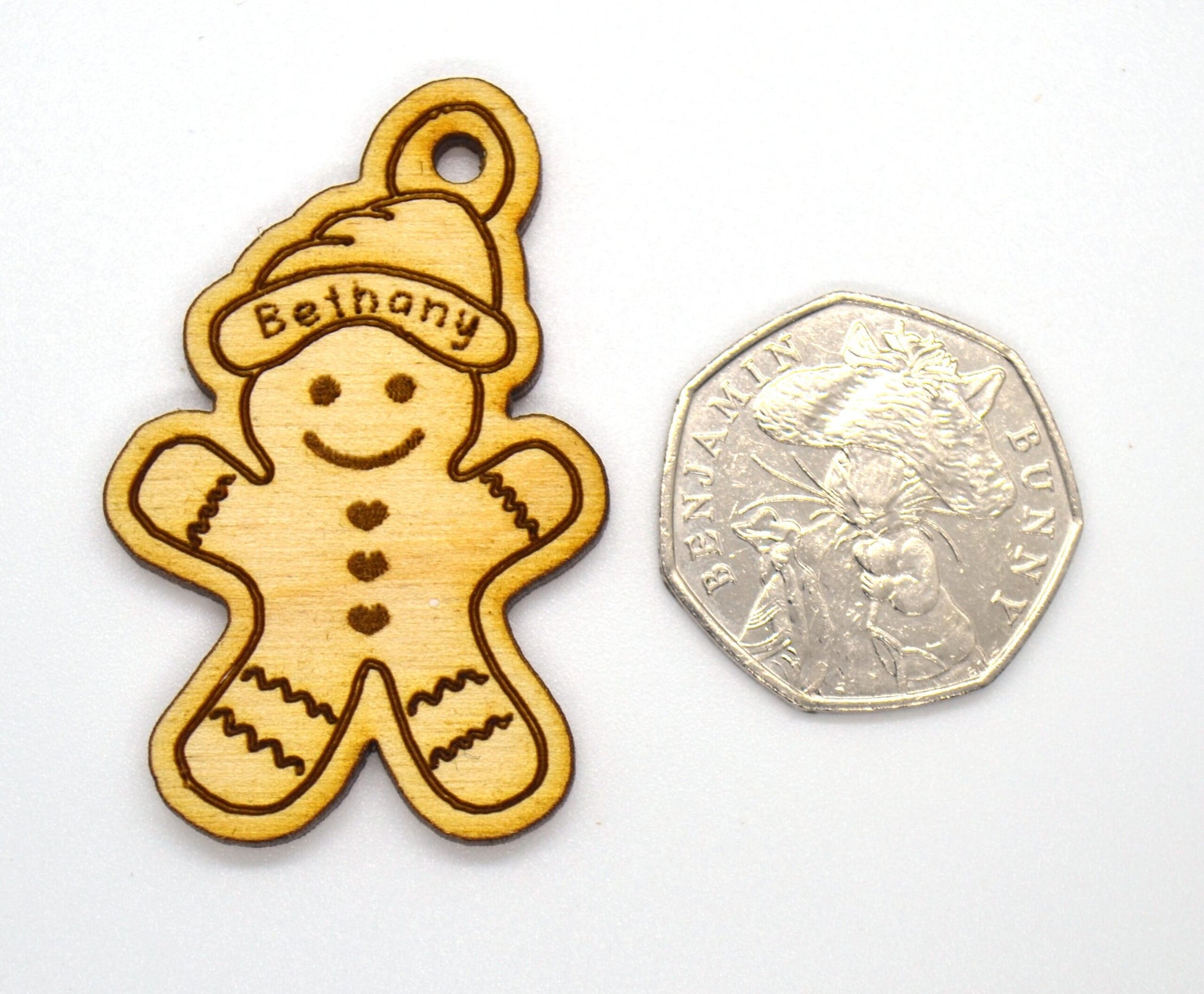 Personalised mini Christmas gingerbread bauble with custom engraving and red, white, or red & white paper string"