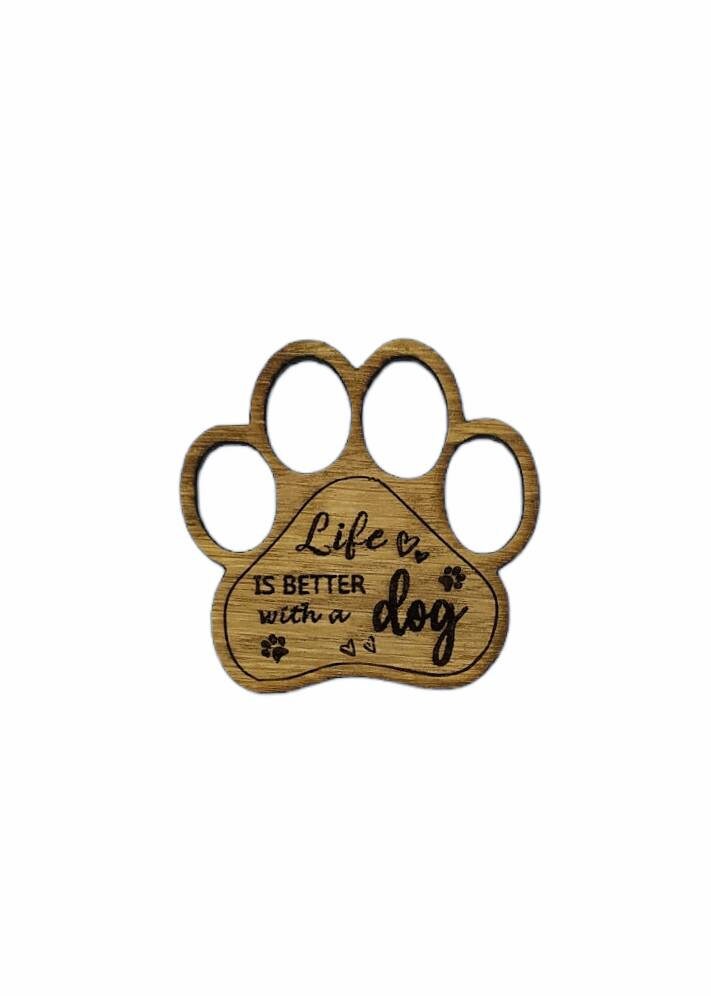 Mini thread holder and needle minder, engraved with the message 'Life is better with a dog'. A practical and heartwarming accessory for any sewing or crafting enthusiast, this dual-purpose item keeps your threads organised and your needles safe.