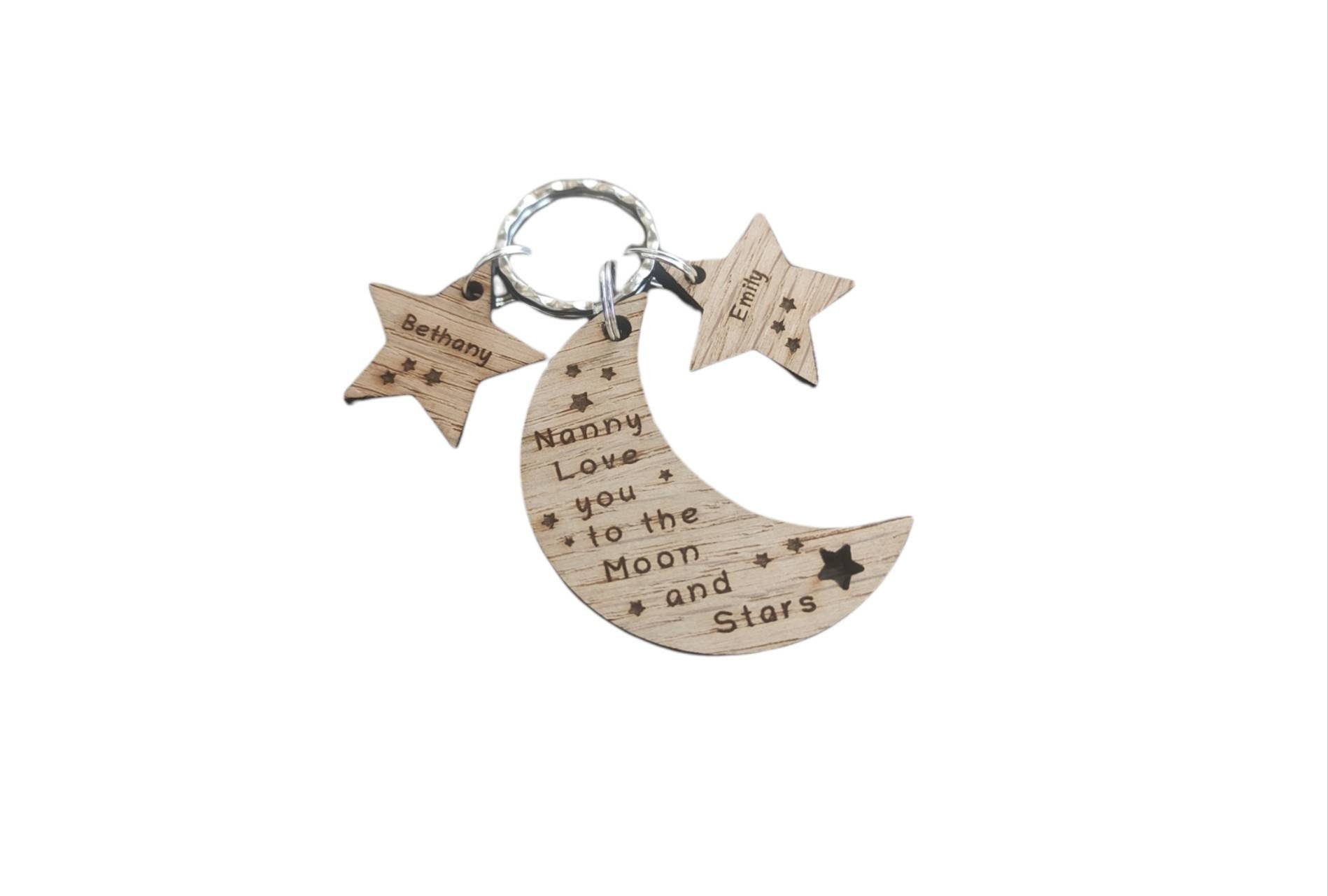 Moon-shaped keyring engraved with "Love you to the Moon & Stars" and star charms engraved with a child's name.