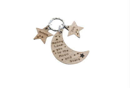 Moon-shaped keyring engraved with "Love you to the Moon & Stars" and star charms engraved with a child's name.