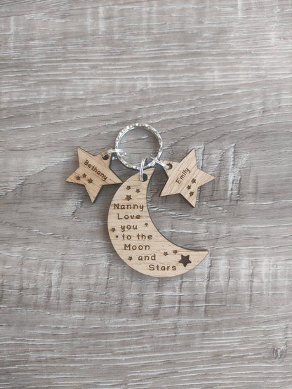 Moon-shaped keyring engraved with "Love you to the Moon & Stars" and star charms engraved with a child's name.