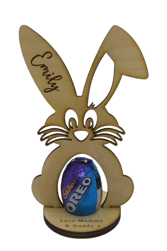 Personalised Bunny Easter Egg Holder, laser engraved with a name on the ear and a message on the base, designed to hold a chocolate egg