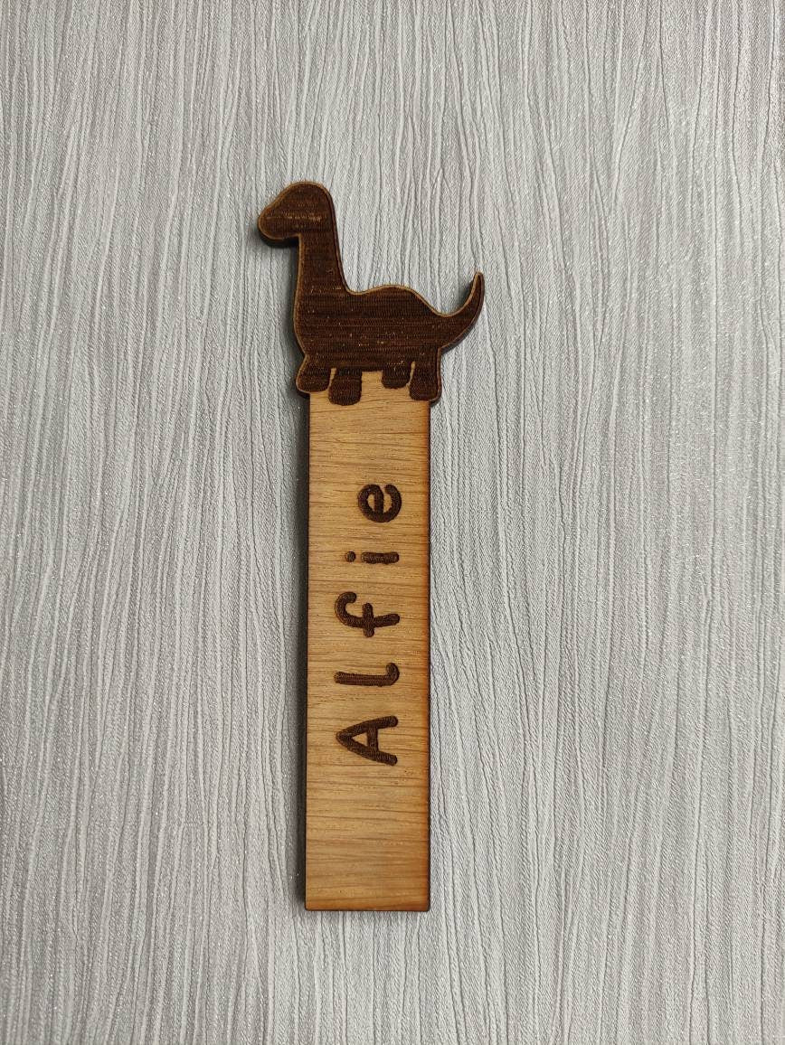 Wooden Diplodocus bookmark engraved with any name, featuring the Diplodocus as part of the design at the top.