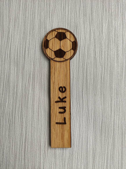 Wooden football bookmark engraved with any name, featuring the football as part of the design at the top.
