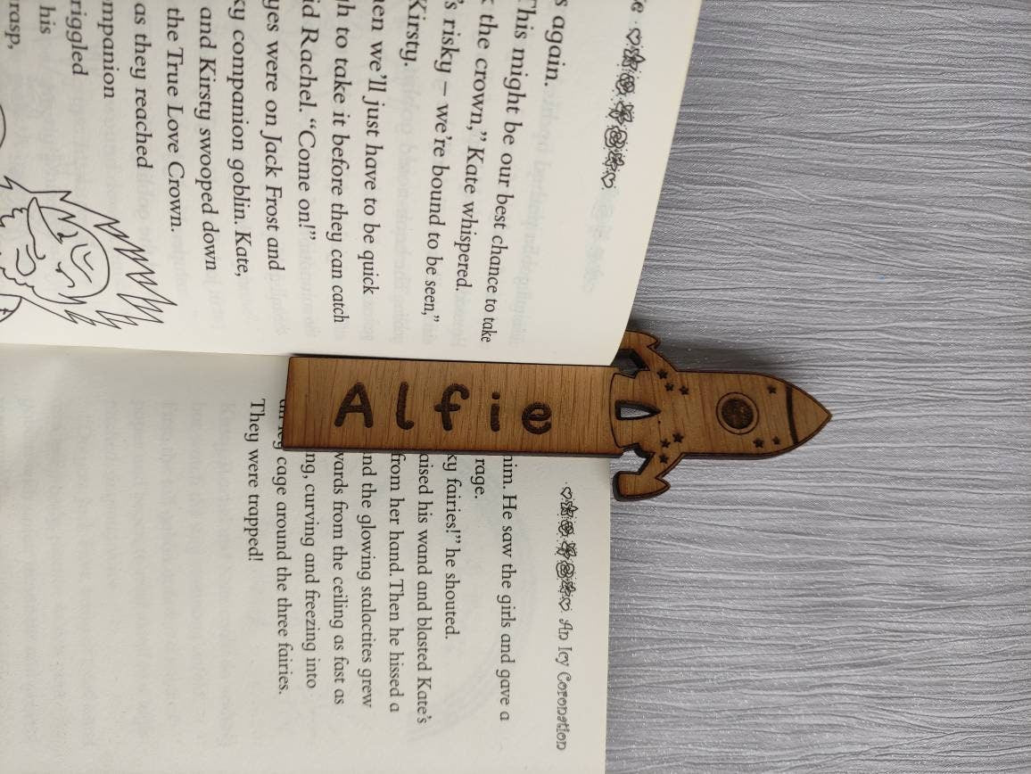 Wooden rocket bookmark engraved with any name, featuring the rocket as part of the design at the top.