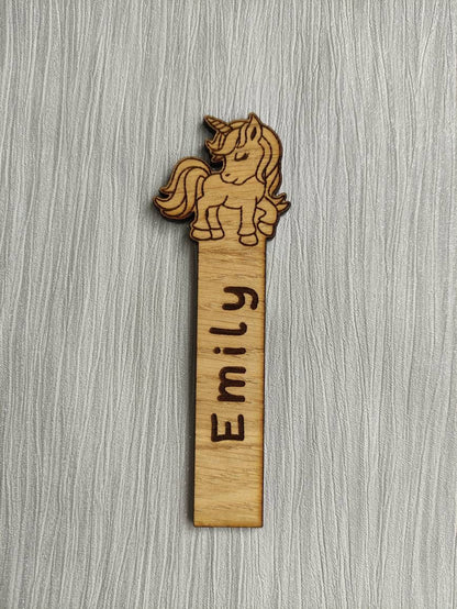 Wooden Unicorn bookmark engraved with any name, featuring the Unicorn as part of the design at the top.