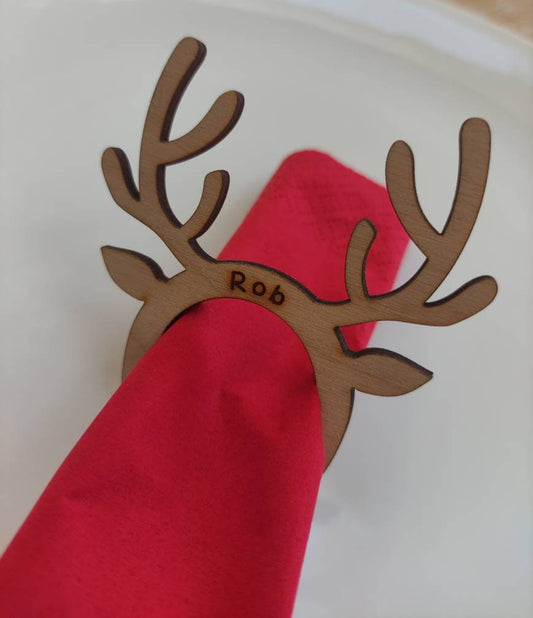 Personalised Reindeer Christmas Table Name & Napkin Holder, engraved with custom name, perfect for Christmas table decor and eco-friendly holiday gifts.