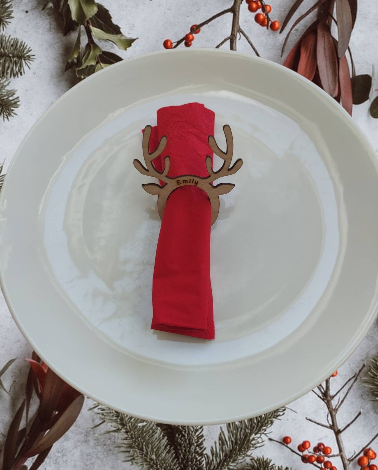 Personalised Reindeer Christmas Table Name & Napkin Holder, engraved with custom name, perfect for Christmas table decor and eco-friendly holiday gifts.