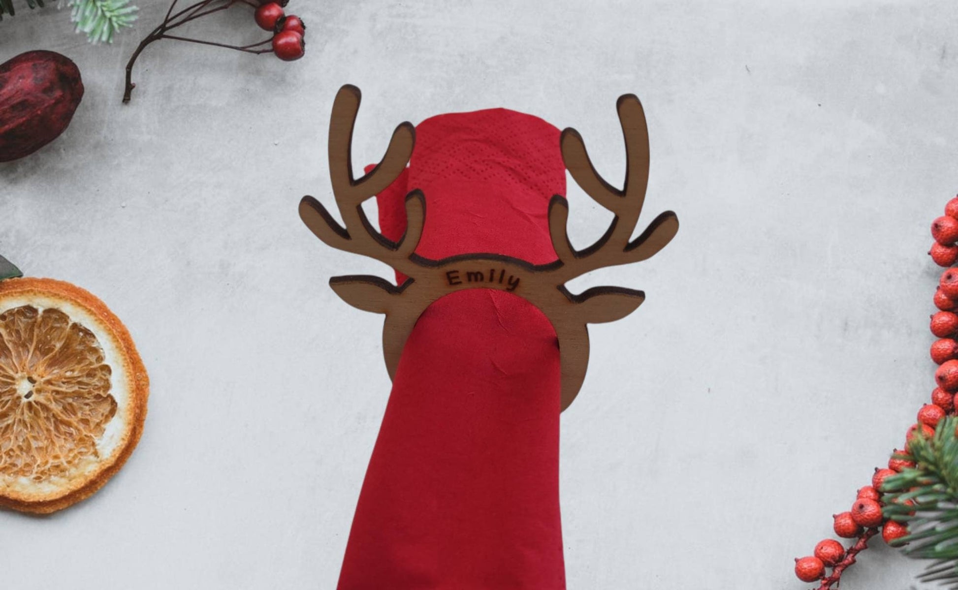 Personalised Reindeer Christmas Table Name & Napkin Holder, engraved with custom name, perfect for Christmas table decor and eco-friendly holiday gifts.