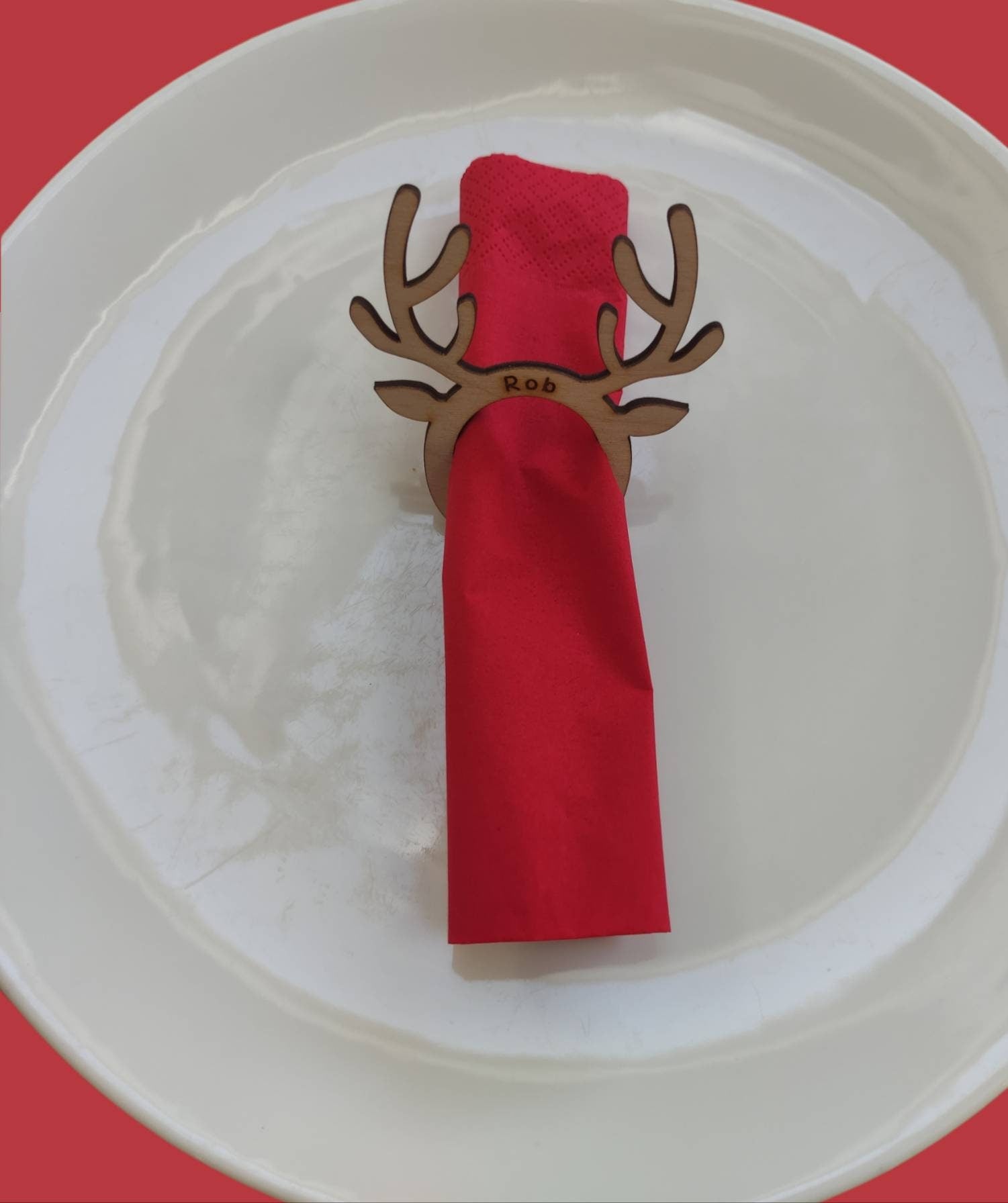Personalised Reindeer Christmas Table Name & Napkin Holder, engraved with custom name, perfect for Christmas table decor and eco-friendly holiday gifts.