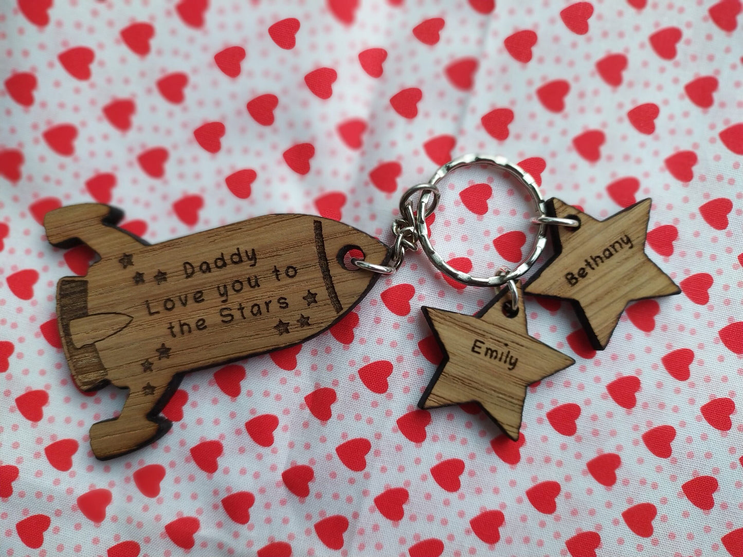 Rocket Shape Keyring and star charms, engraved with Love you to the Stars. 