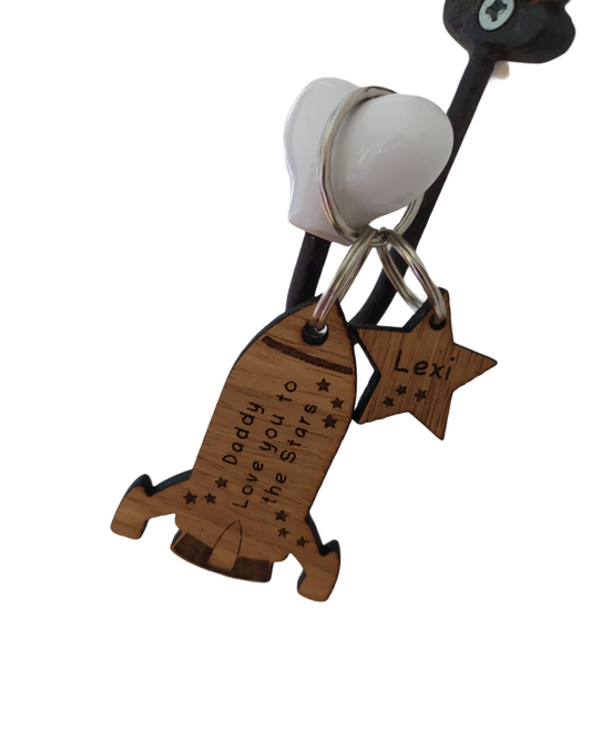 Rocket Shape Keyring and star charms, engraved with Love you to the Stars. 