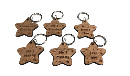 Star-shaped keyrings engraved with custom wording of your choice.