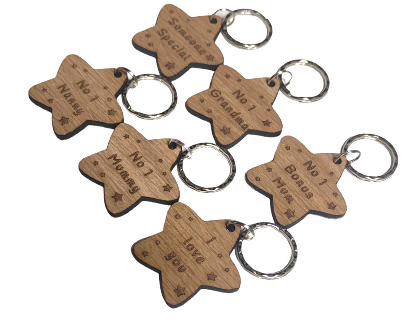 Star-shaped keyrings engraved with custom wording of your choice.