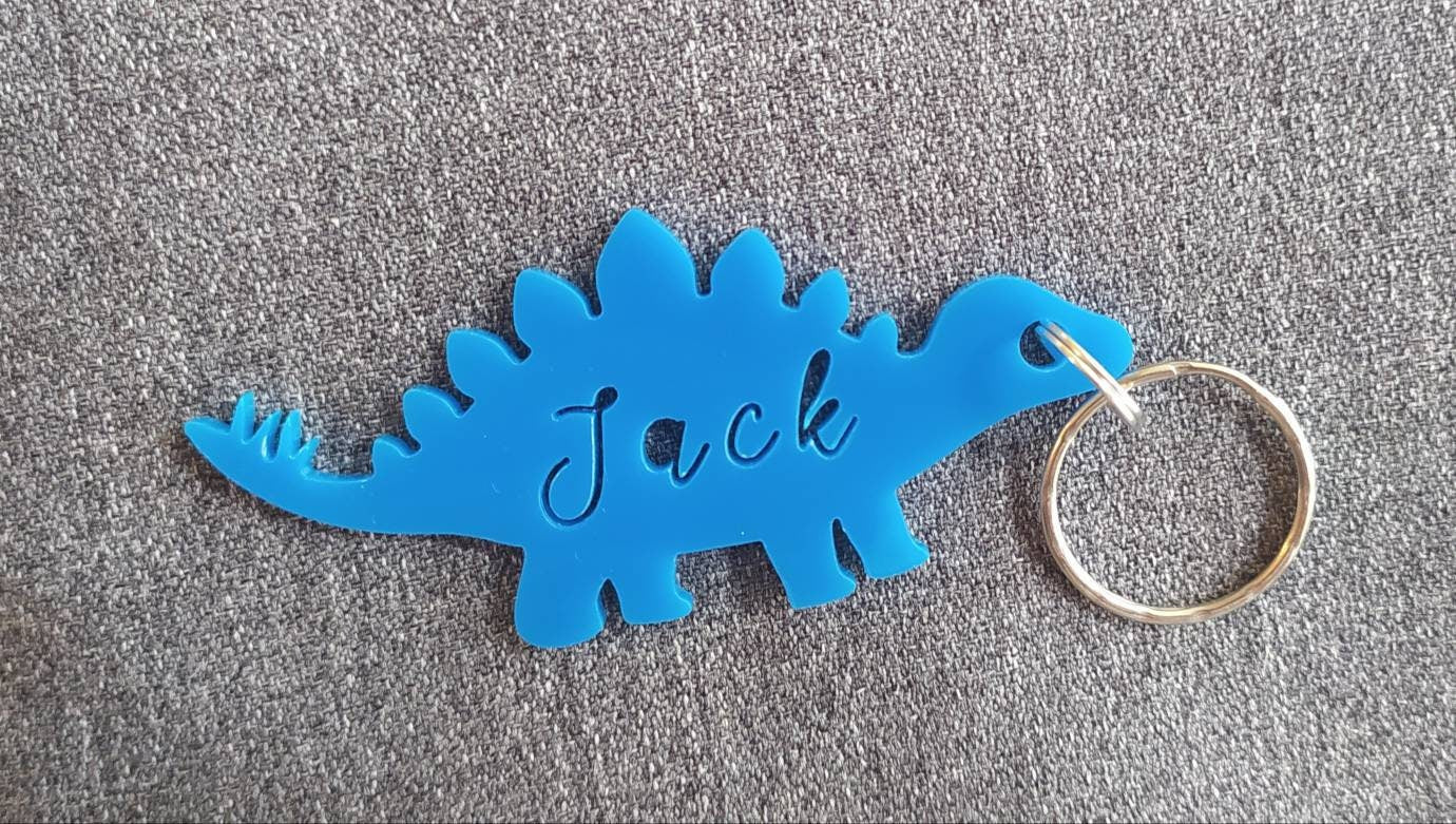 Coloured acrylic keyrings with a name cut out in various fun designs.