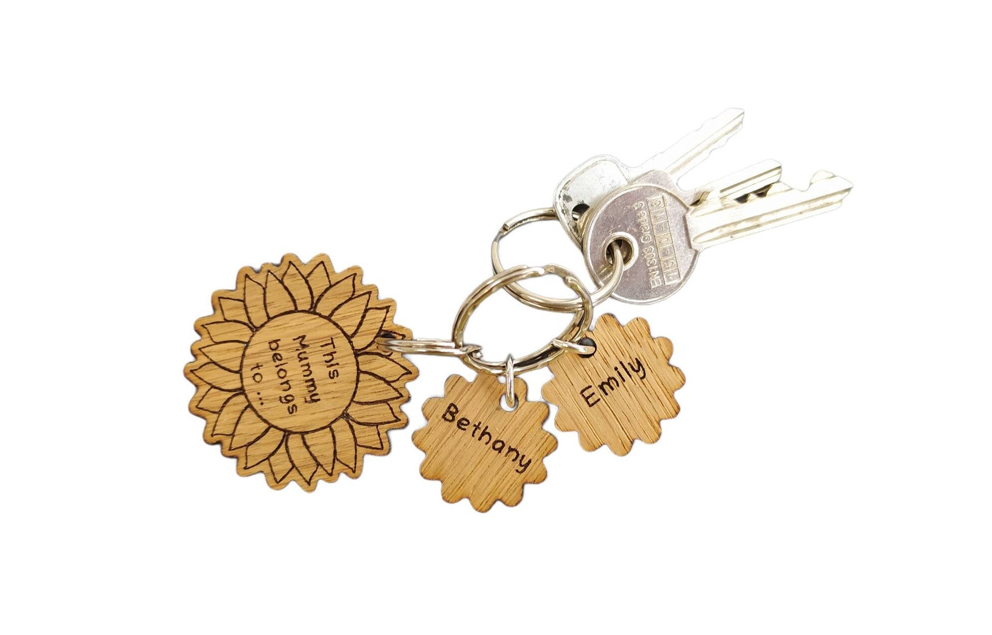 Sunflower-style keyring engraved with "This (any name) belongs to..." and customisable with additional charms.