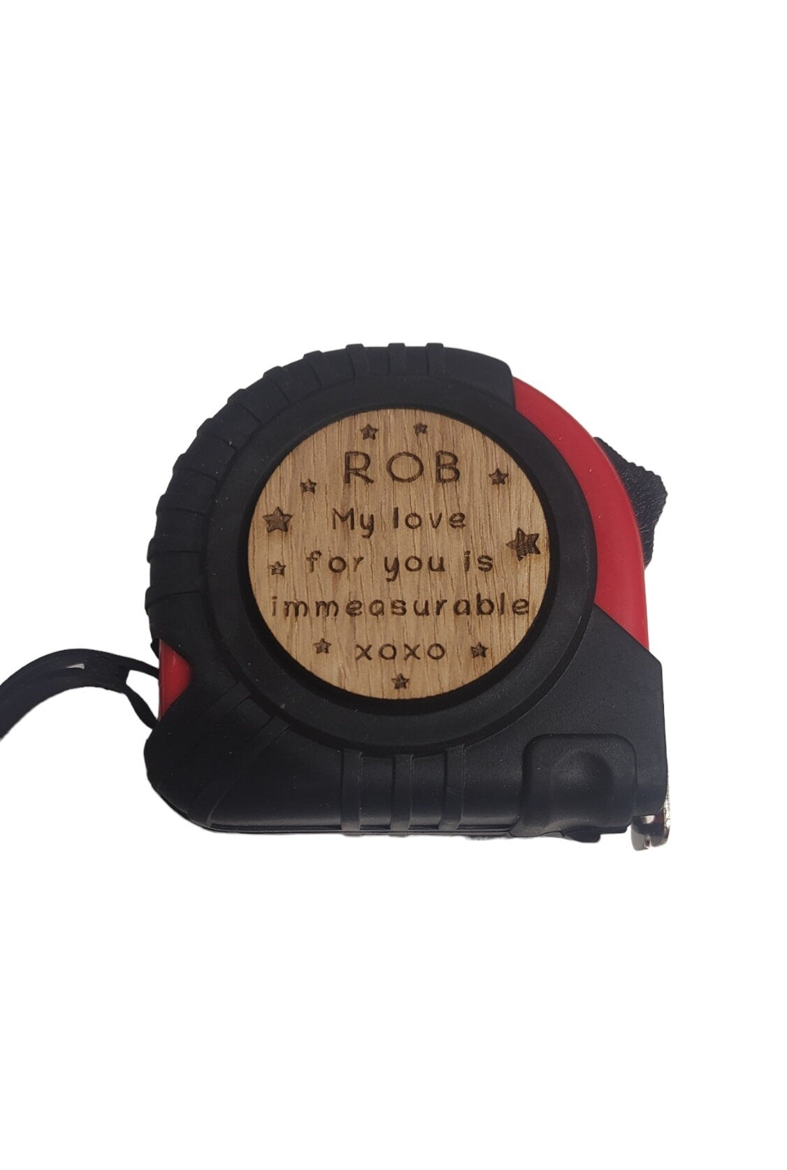 Personalised tape measure with a wooden disc, custom engraved names with your chosen message. This unique, functional gift combines practicality with a fun, stylish touch.