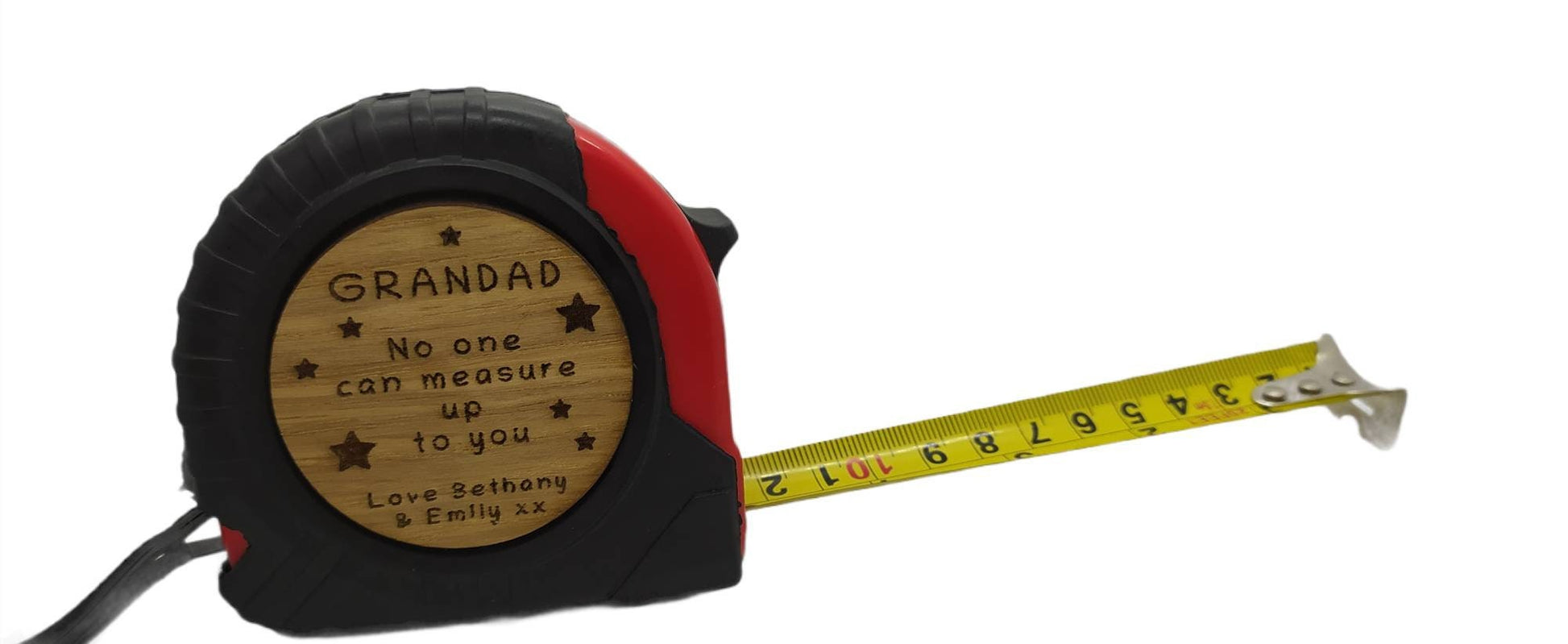 Personalised tape measure with a wooden disc, custom engraved names with your chosen message. This unique, functional gift combines practicality with a fun, stylish touch.