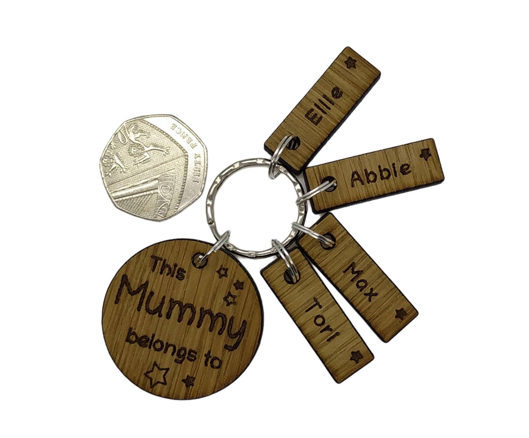 This Mummy belongs to circle keyring with engraved rectangle name charms attached.