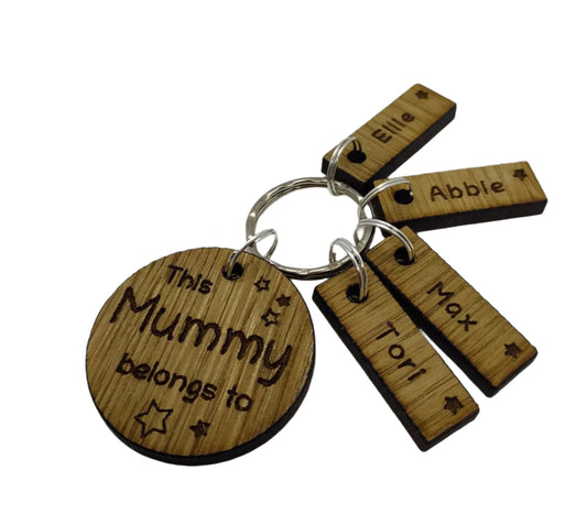 This Mummy belongs to circle keyring with engraved rectangle name charms attached.