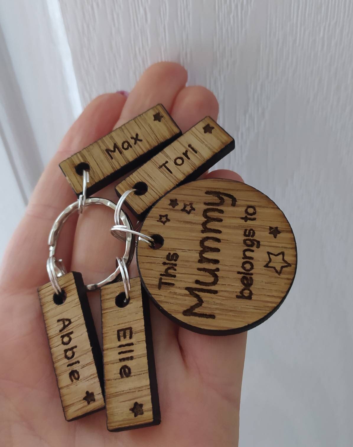 This Mummy belongs to circle keyring with engraved rectangle name charms attached.