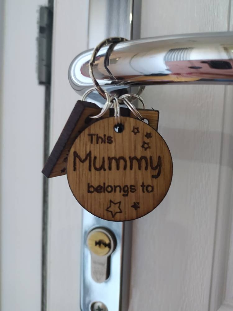 This Mummy belongs to circle keyring with engraved rectangle name charms attached.
