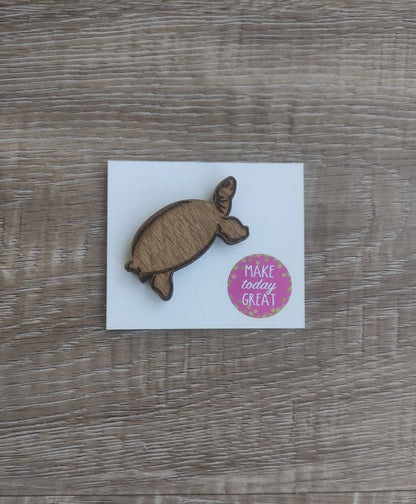 Tortoise-shaped needle minder, perfect for keeping needles secure while crafting.