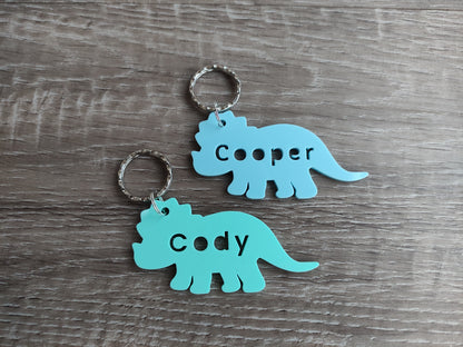 Triceratops acrylic keyring, cut out with any name in the middle. 