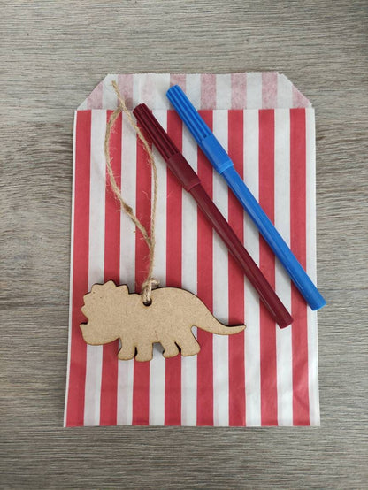 Wooden laser-cut shape with a hole at the top for hanging, string included, and 2 coloured pens inside a paper bag.