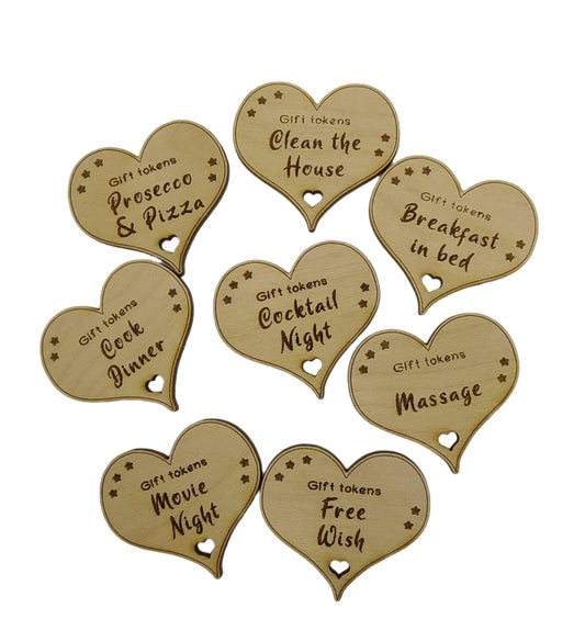 Personalised heart-shaped gift tokens, custom engraved with a message. A charming keepsake perfect for gifting, featuring a smooth finish and unique design.