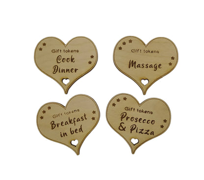 Personalised heart-shaped gift tokens, custom engraved with a message. A charming keepsake perfect for gifting, featuring a smooth finish and unique design.