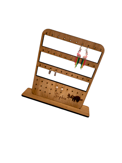 Personalised wooden earring holder for studs & hoops/hook, wit 3 rows for Hoops/Hooks and 3 row for studs. With a Sloth design.