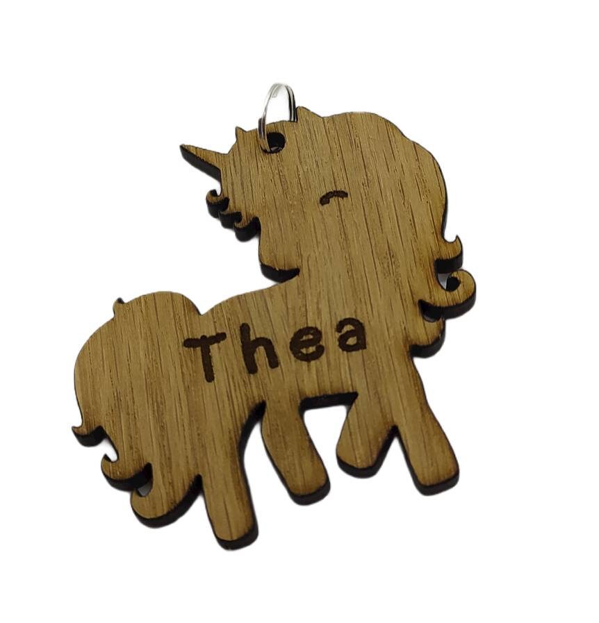 Coloured acrylic keyrings with a name cut out in various fun designs.