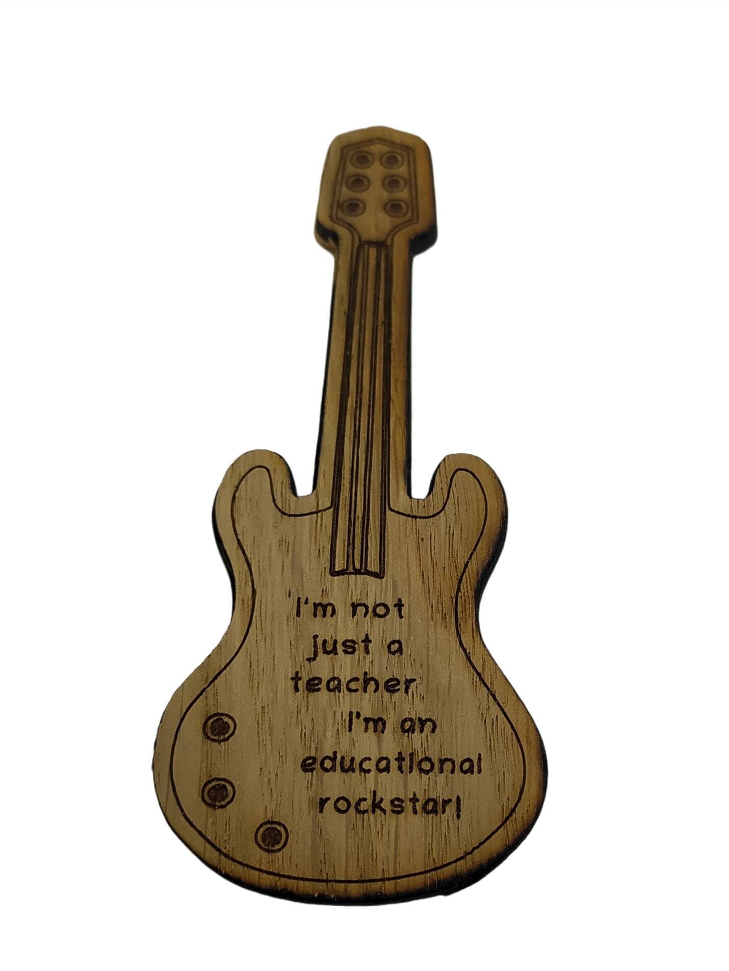Personalised oak veneer guitar bookmark engraved with any name, followed by the message 'You're not just a teacher, you're an educational rockstar!' A perfect gift for music teachers or guitar lovers.