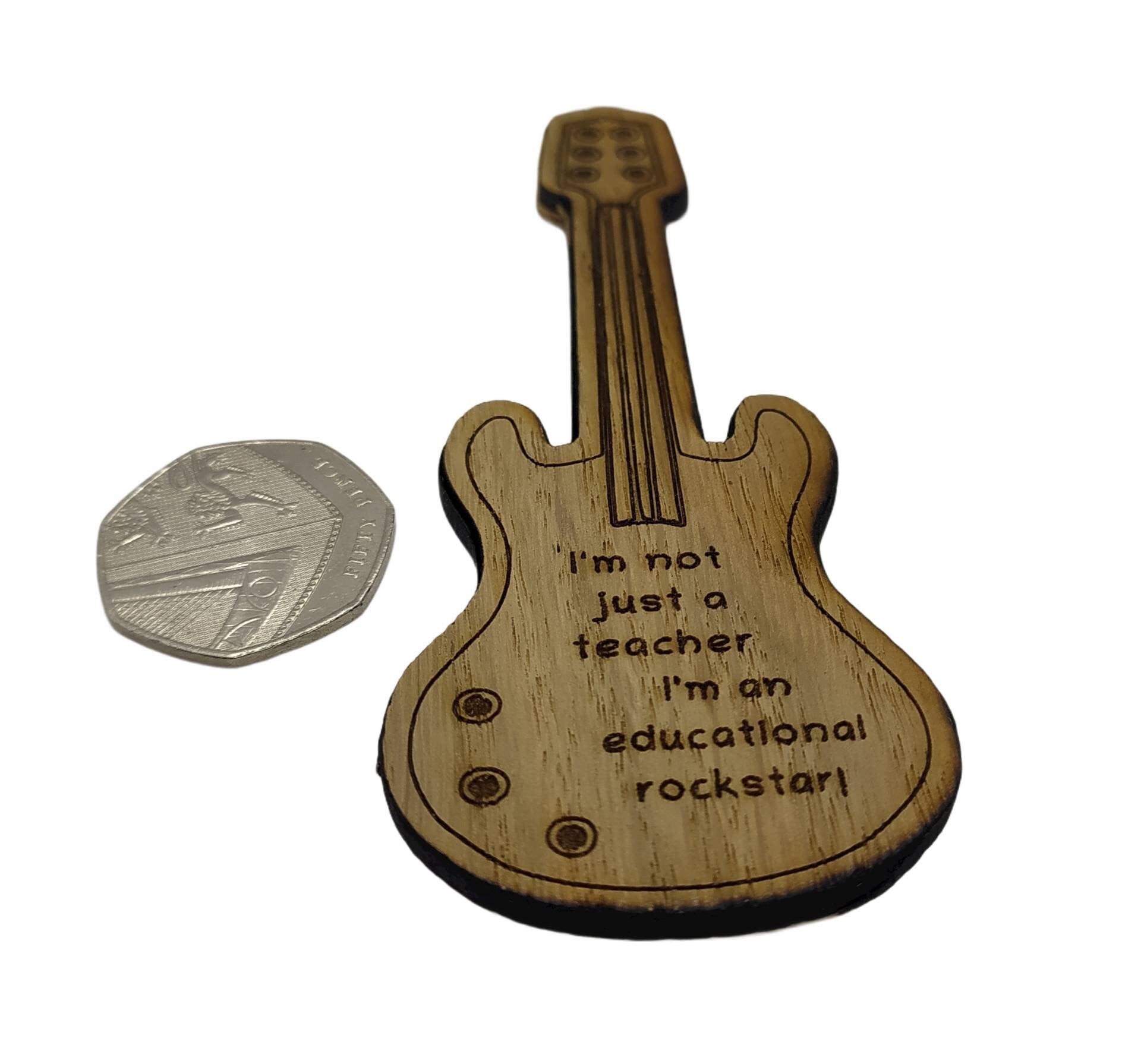 Personalised oak veneer guitar bookmark engraved with any name, followed by the message 'You're not just a teacher, you're an educational rockstar!' A perfect gift for music teachers or guitar lovers.