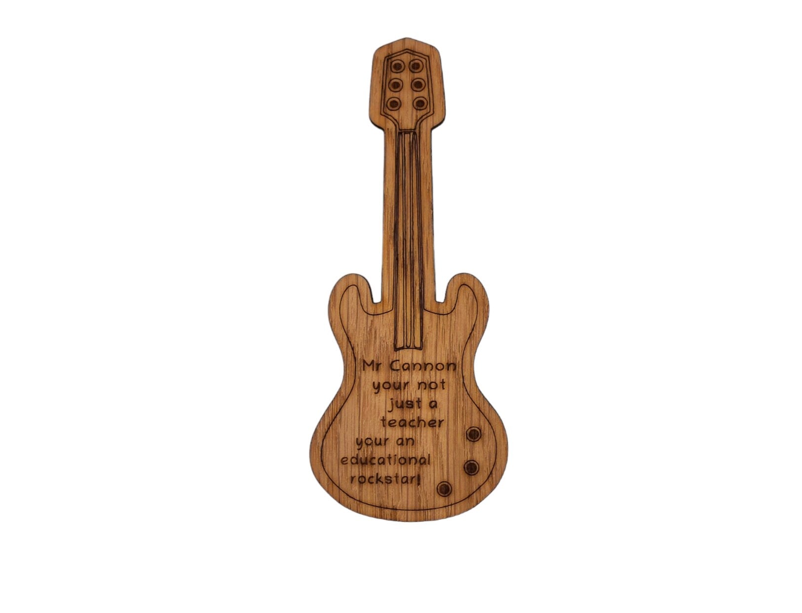 Personalised oak veneer guitar bookmark engraved with any name, followed by the message 'You're not just a teacher, you're an educational rockstar!' A perfect gift for music teachers or guitar lovers.