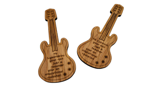 Personalised oak veneer guitar bookmark engraved with any name, followed by the message 'You're not just a teacher, you're an educational rockstar!' A perfect gift for music teachers or guitar lovers.