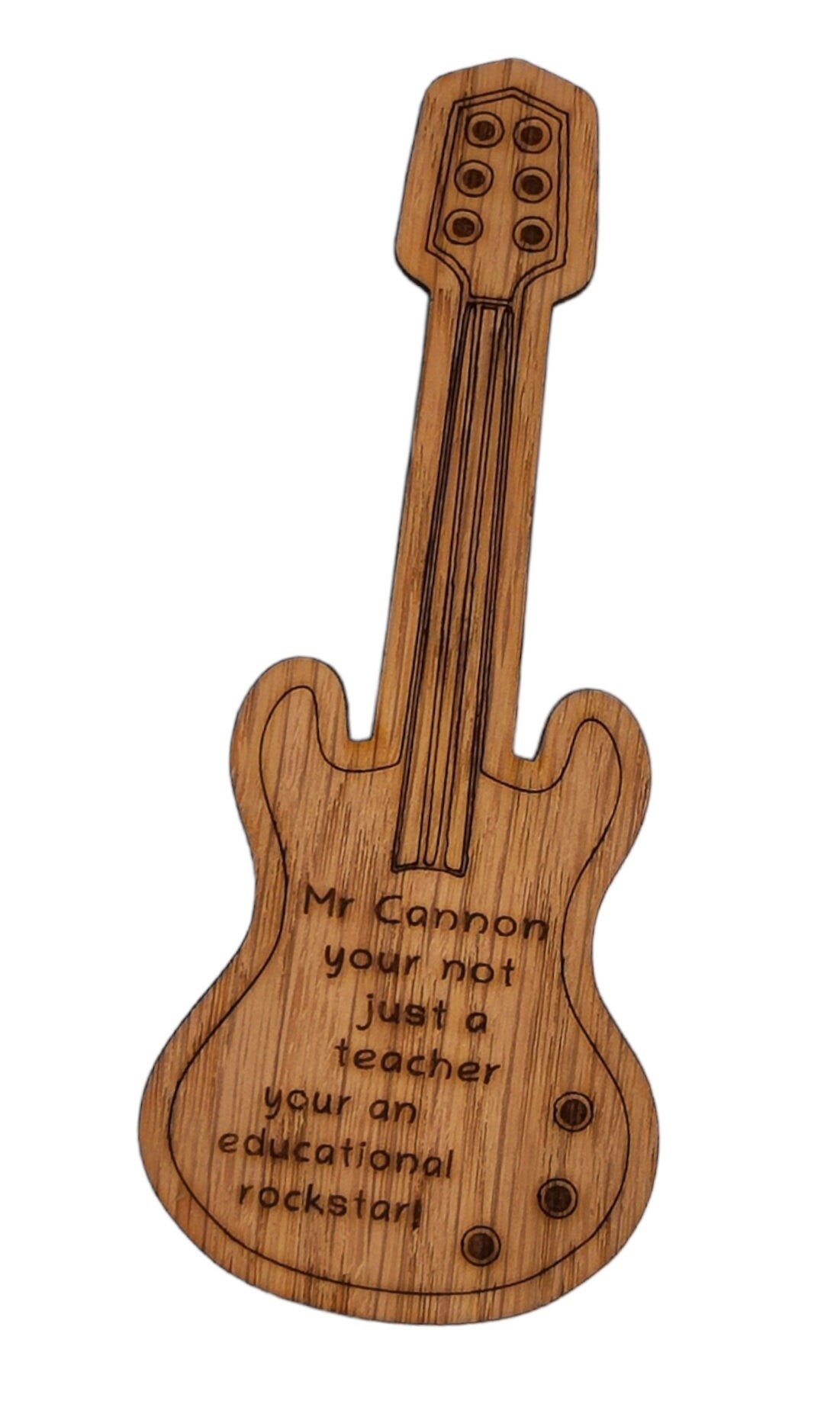 Personalised oak veneer guitar bookmark engraved with any name, followed by the message 'You're not just a teacher, you're an educational rockstar!' A perfect gift for music teachers or guitar lovers.
