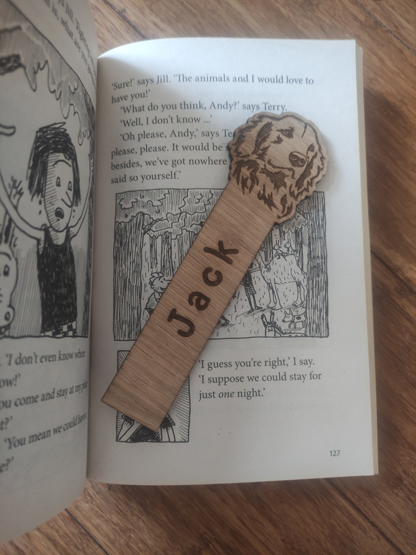 Personalised oak veneer dog bookmark with a dog design at the top and a custom name engraved vertically down the middle. Perfect for children's gifts, stocking stuffers, and party bag fillers.